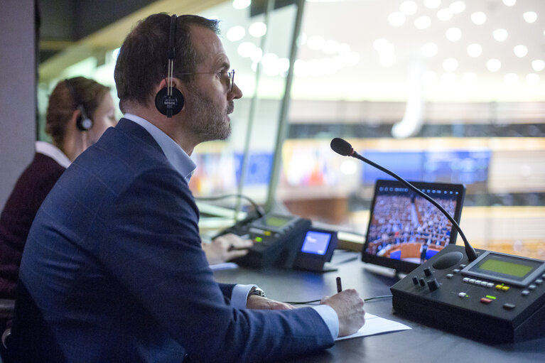 Photo 7: Interpreter in action at the EP in Brussels during plenary session