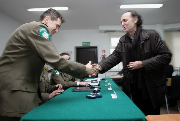 Photo 49: European Parliament members visit a refugee center in Biala Podlaska, Poland, April 2, 2008...