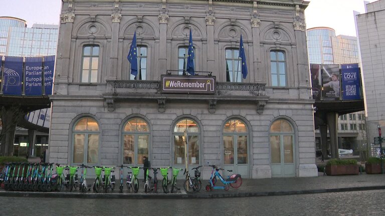 Holocaust Remembrance day: Station Europe building in Brussels displaying the banner #WeRemember